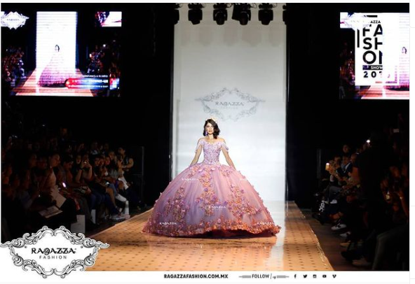 Quinceanera catwalk Gown, a woman walking down a runway wearing a pink dress