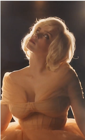 Blond Billie Eilish, a woman in a yellow dress posing for a picture at a Quinceanera