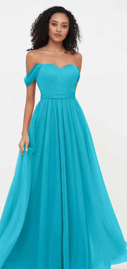Quinceanera, a woman in a blue dress posing for a picture at riverside camping in shnongpdeng.