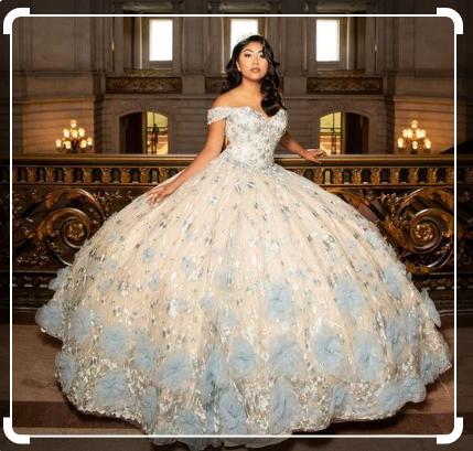 A woman in a Quinceanera ball gown posing for a picture